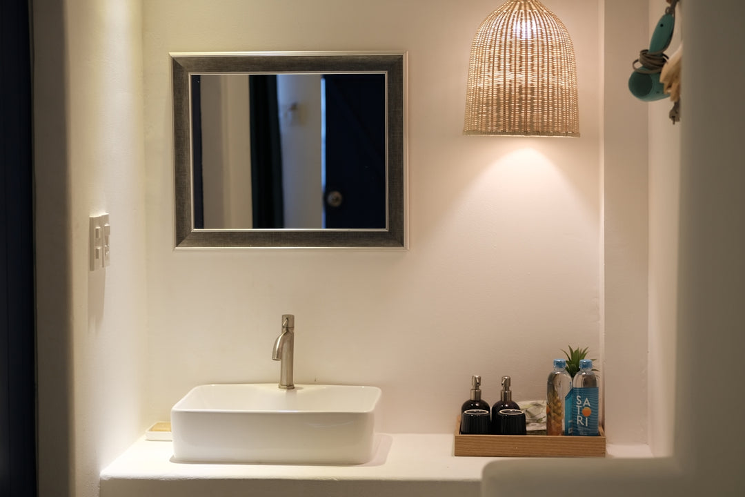 white wash basin and stainless steel faucet