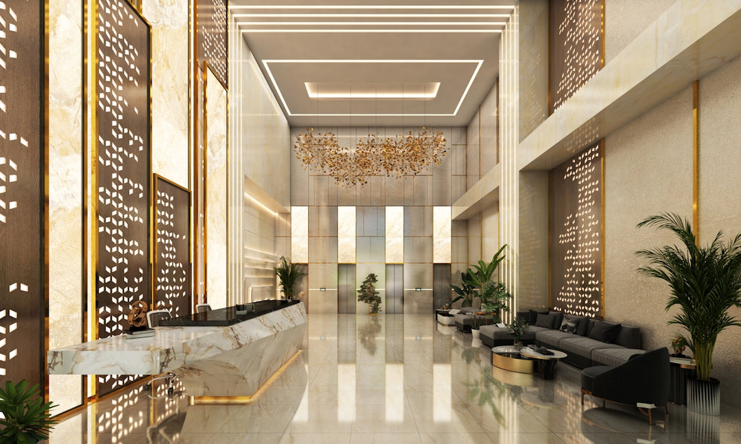 Modern hotel lobby with sleek reception desk and seating.