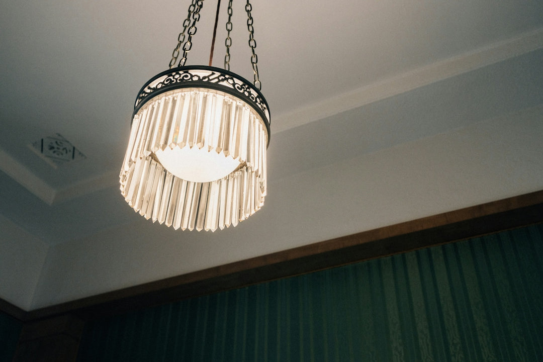 A decorative chandelier hangs from the ceiling