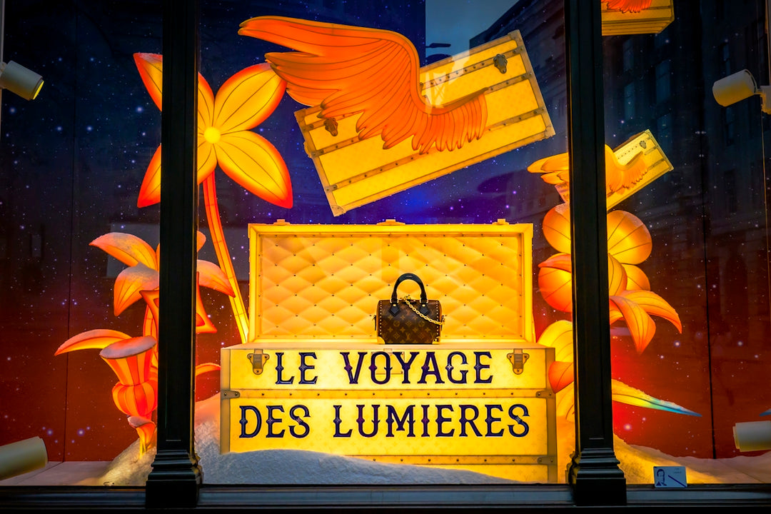 Louis vuitton display with le voyage des lumieres text.