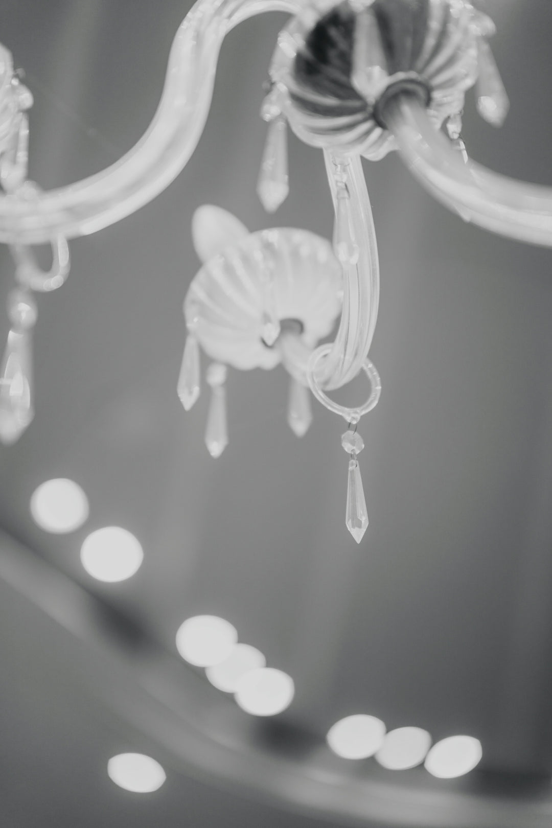 Close-up of a vintage chandelier with crystal accents.